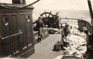 Monkbarns at sea, October 1925 - Old Man (Captain William Davies) Russell at helm and 'Sails', Henry Robertson